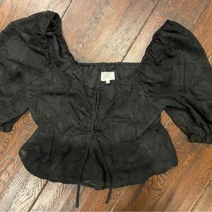 Chic Black Blouse with Ruffled Sleeves and Lightweight Fabric